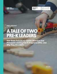 Image of a child playing with a train set